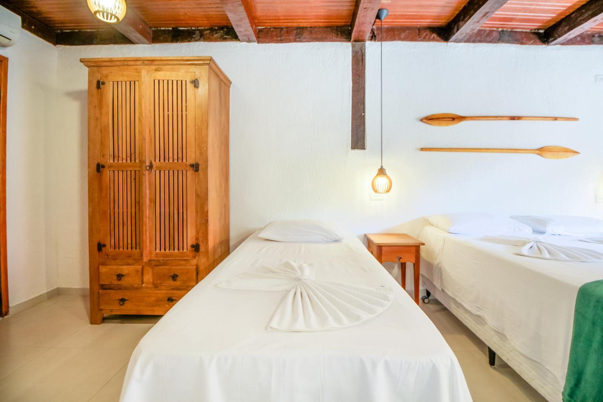 Velinn Pousada Canoa Ilhabela Quarto foto