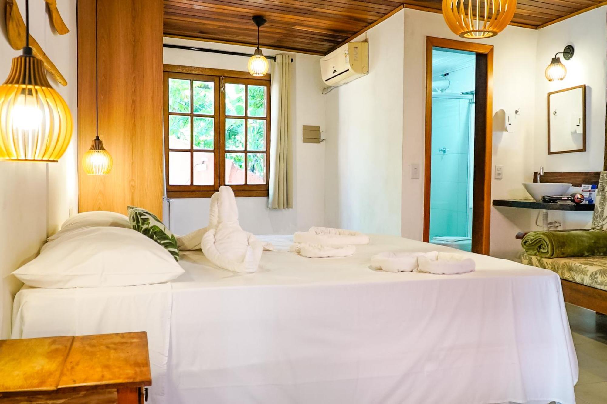 Velinn Pousada Canoa Ilhabela Quarto foto